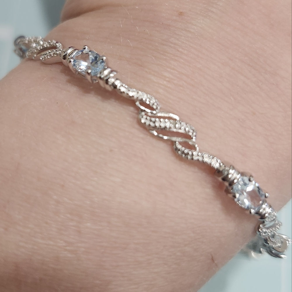 Sterling Silver And Blue Topaz Diamond Accent Bracelet